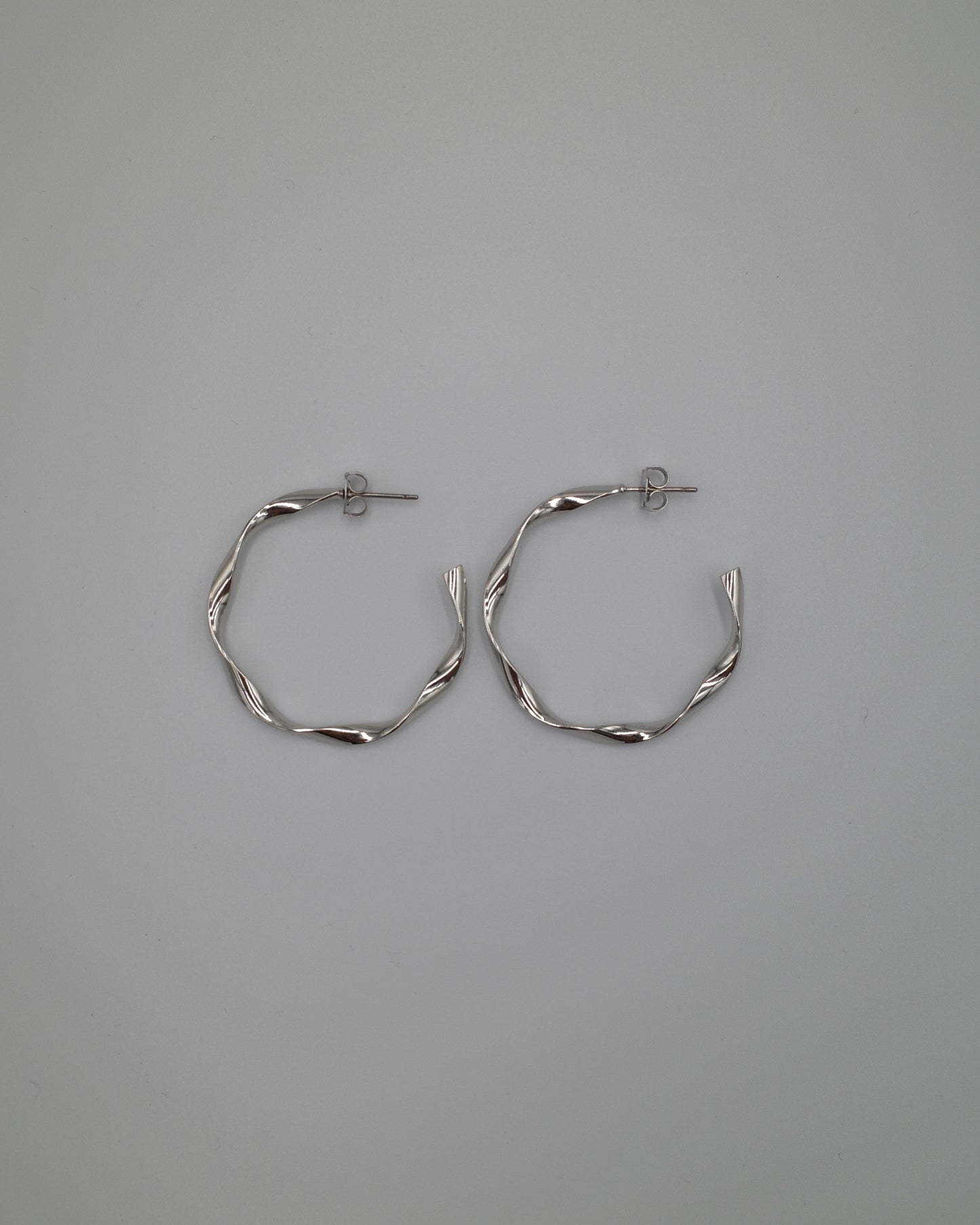twist hoop pierce