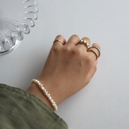 shiny puffy pinky ring