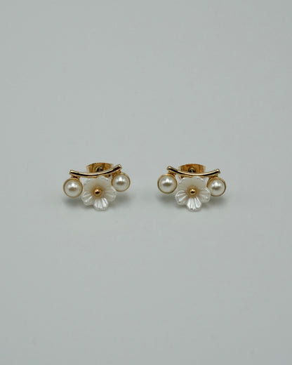 between flower pierce & earring