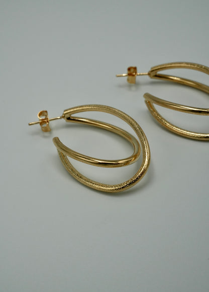 crossed rings pierce