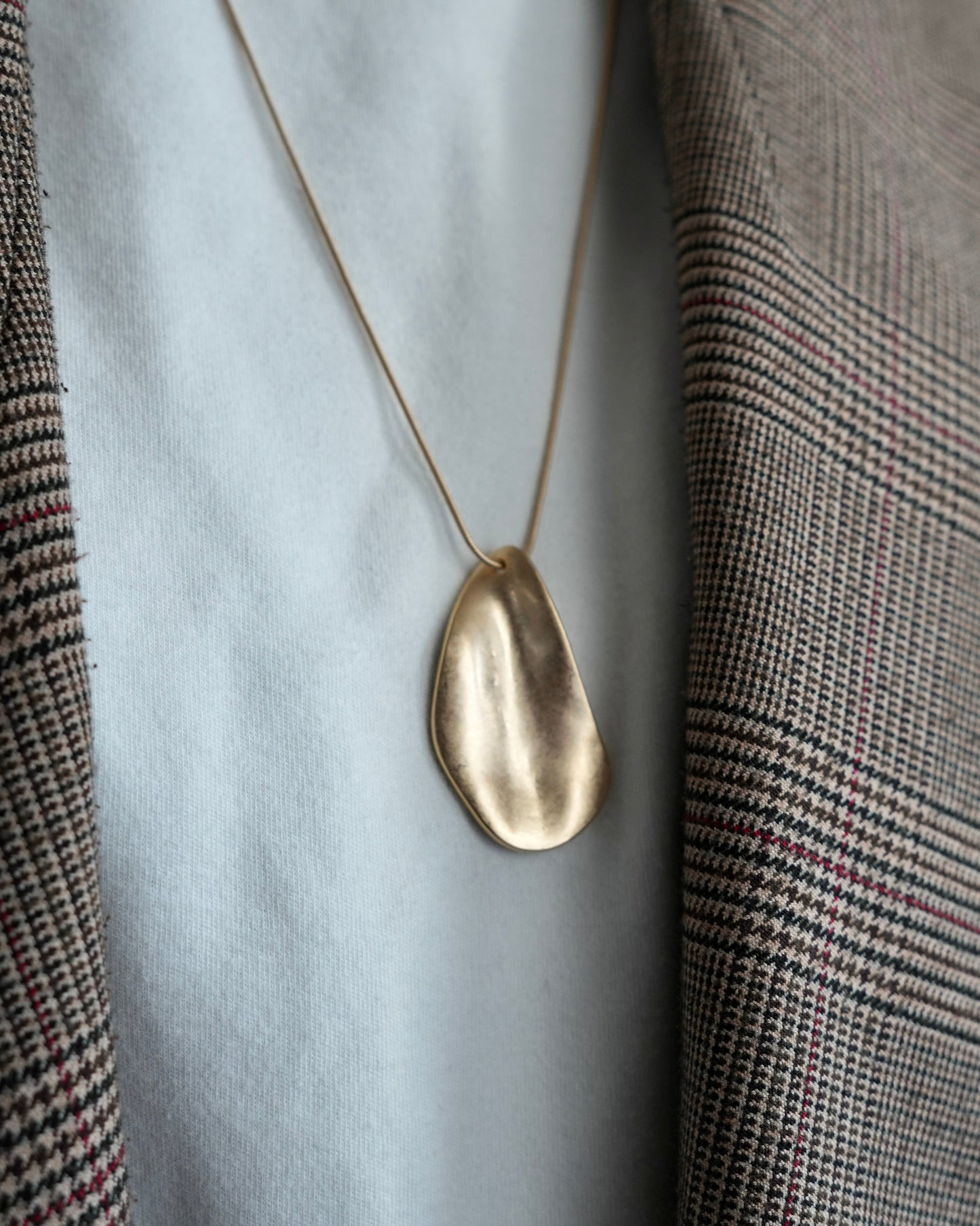 limp plate necklace