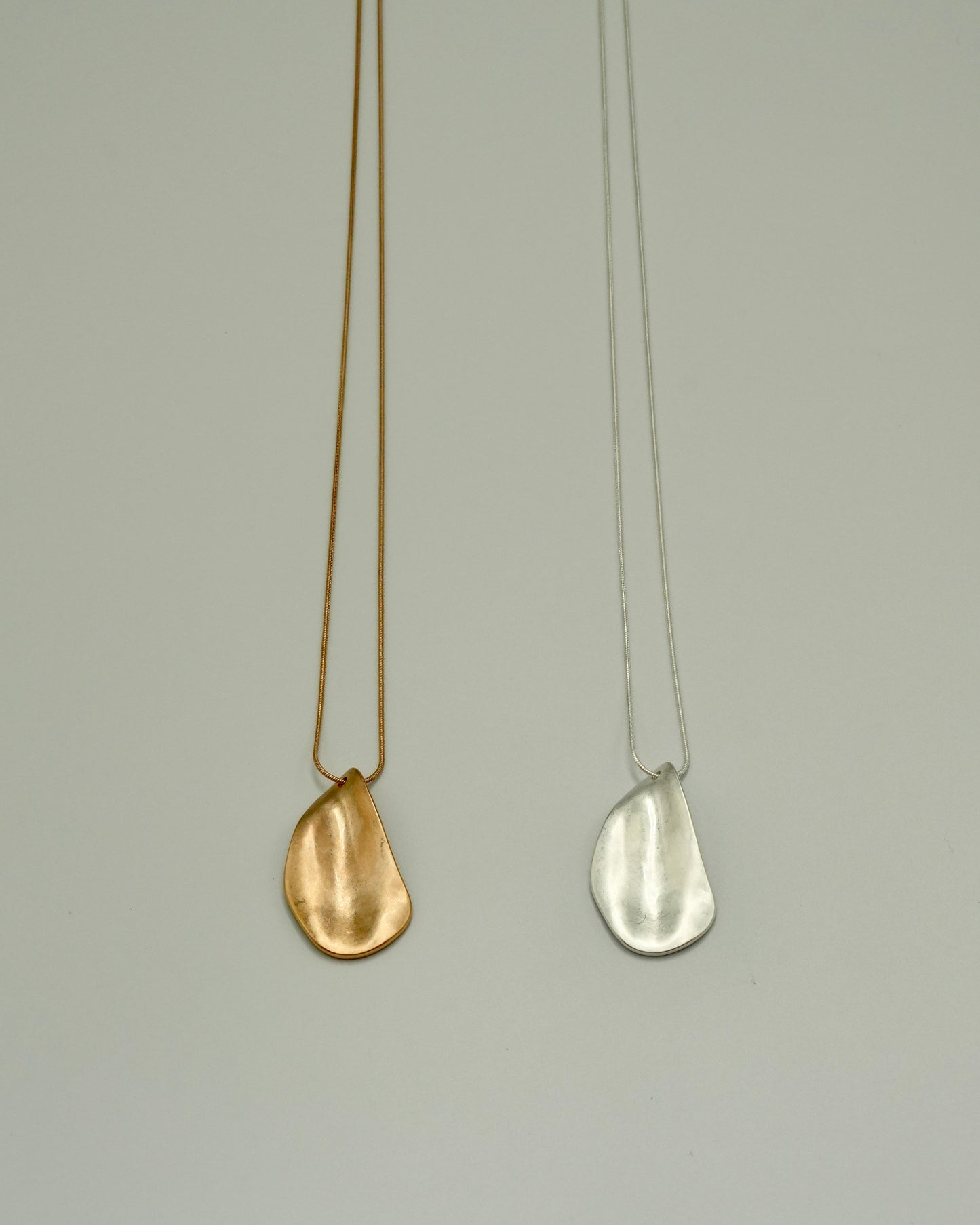 limp plate necklace