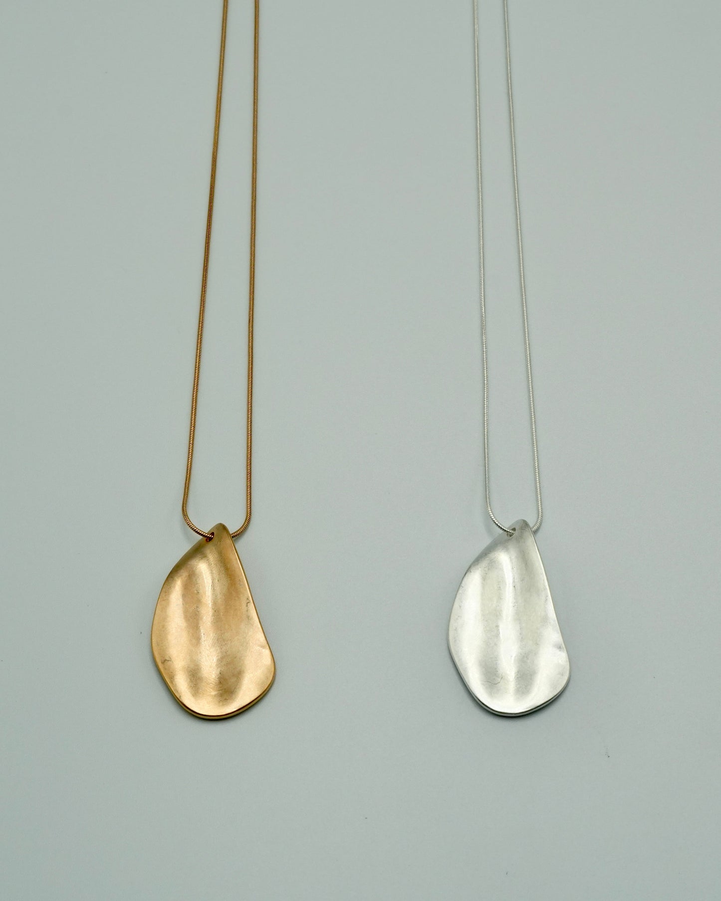 limp plate necklace