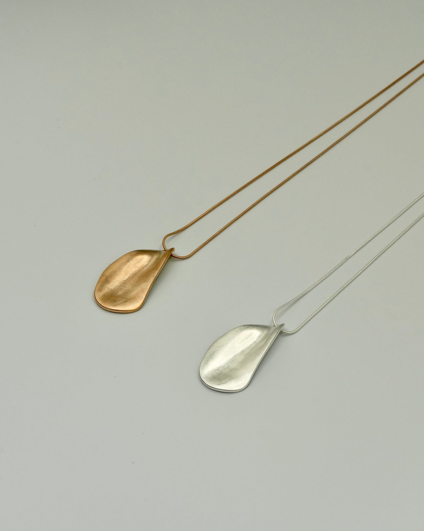 limp plate necklace
