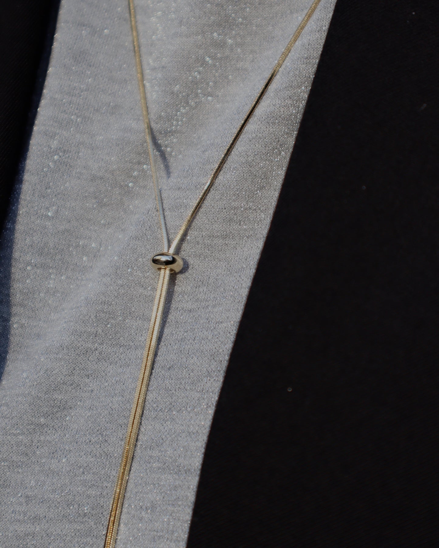 loop tie necklace