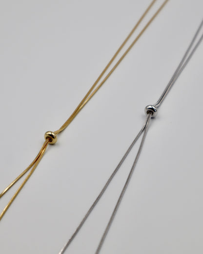 loop tie necklace