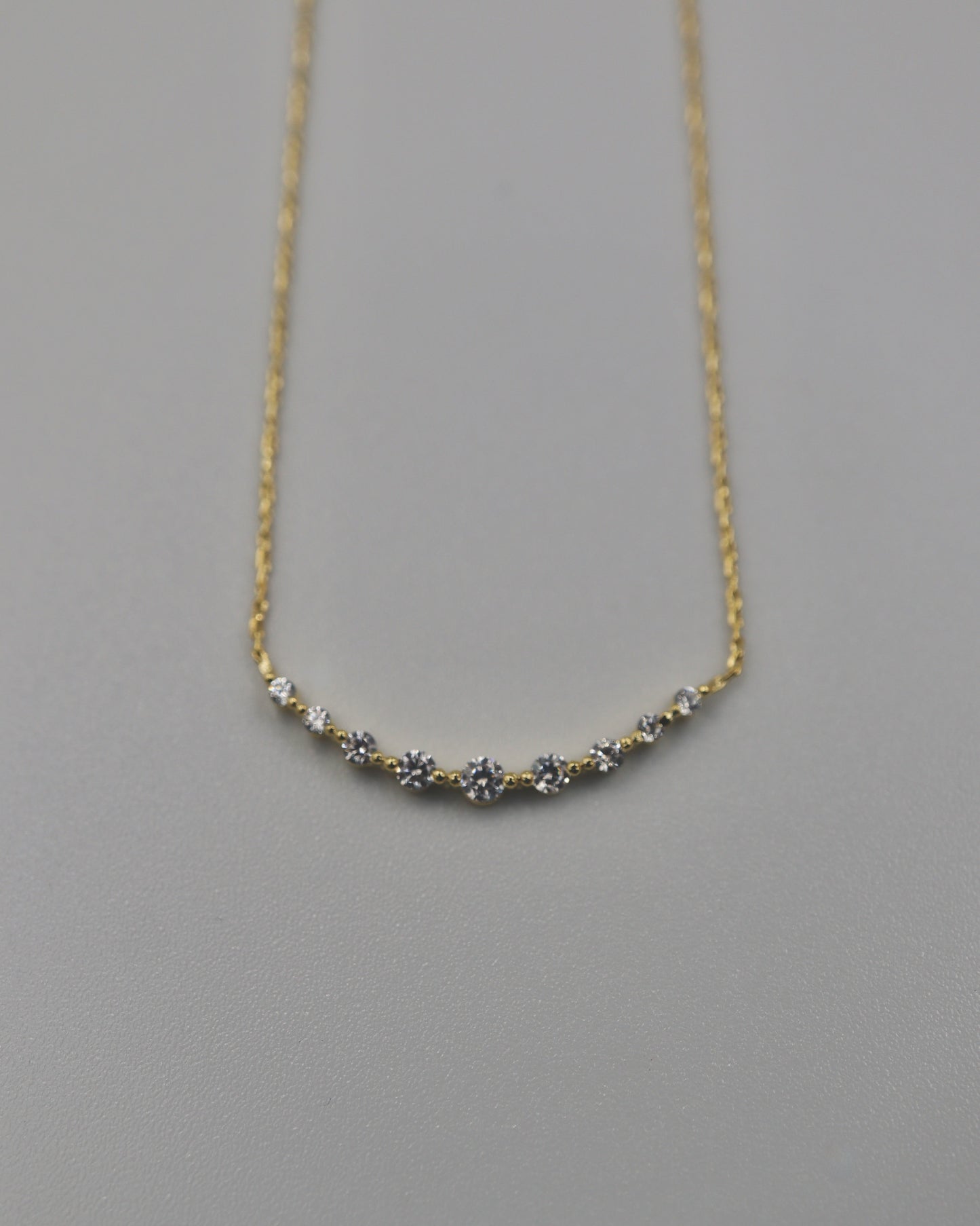 zir long arch necklace