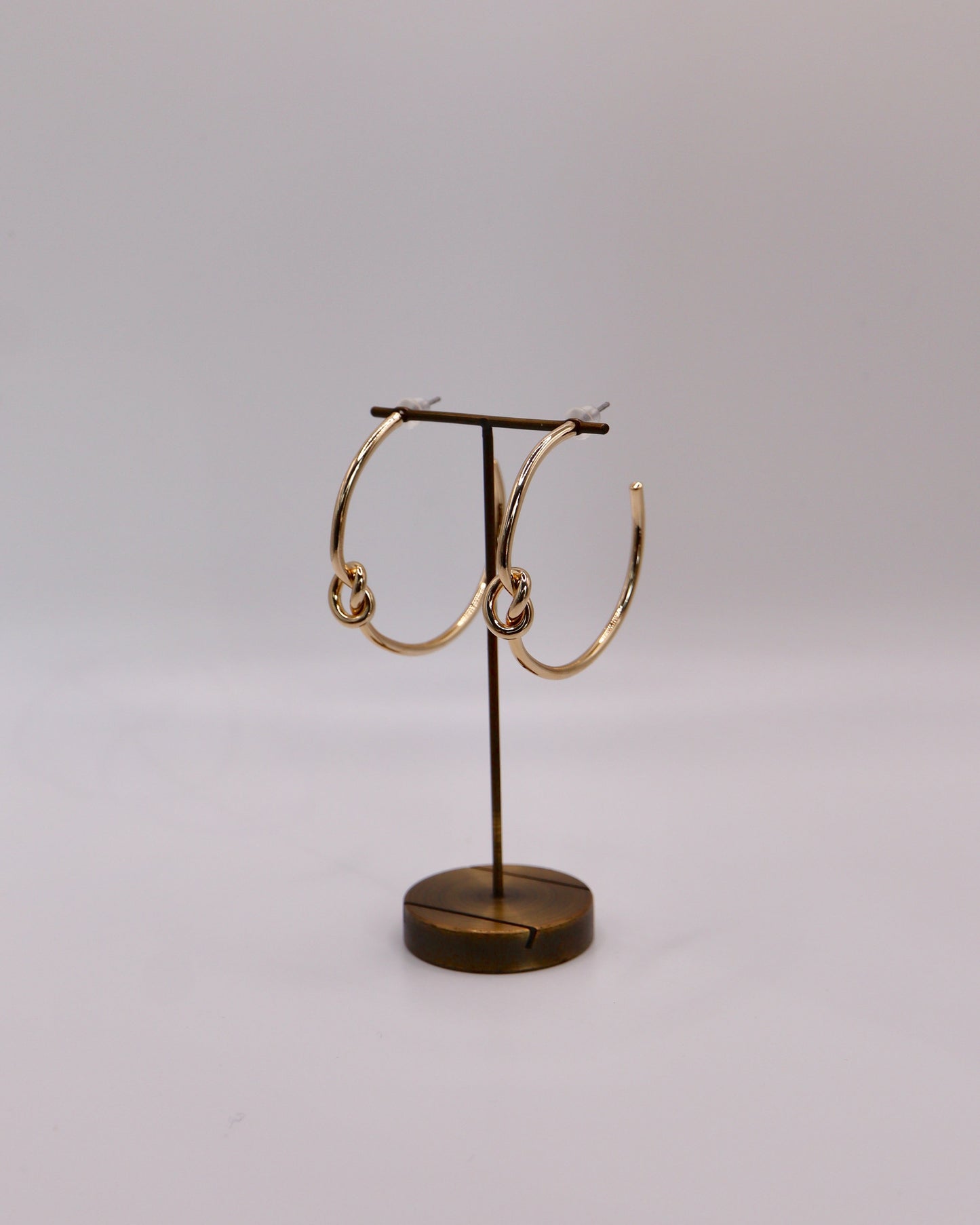 knot hoop pierce