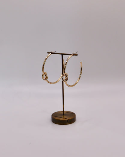 knot hoop pierce