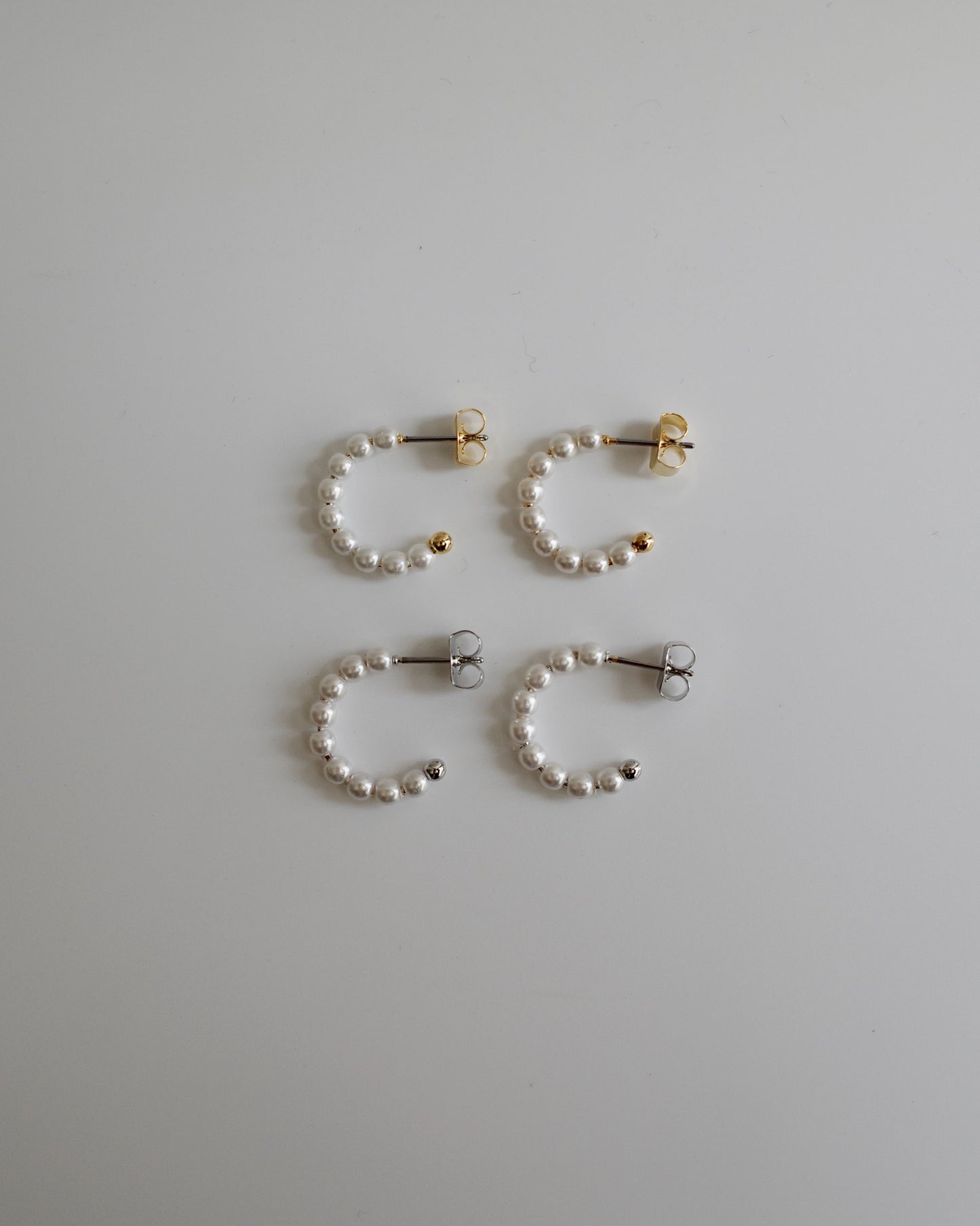 pearl curl pierce