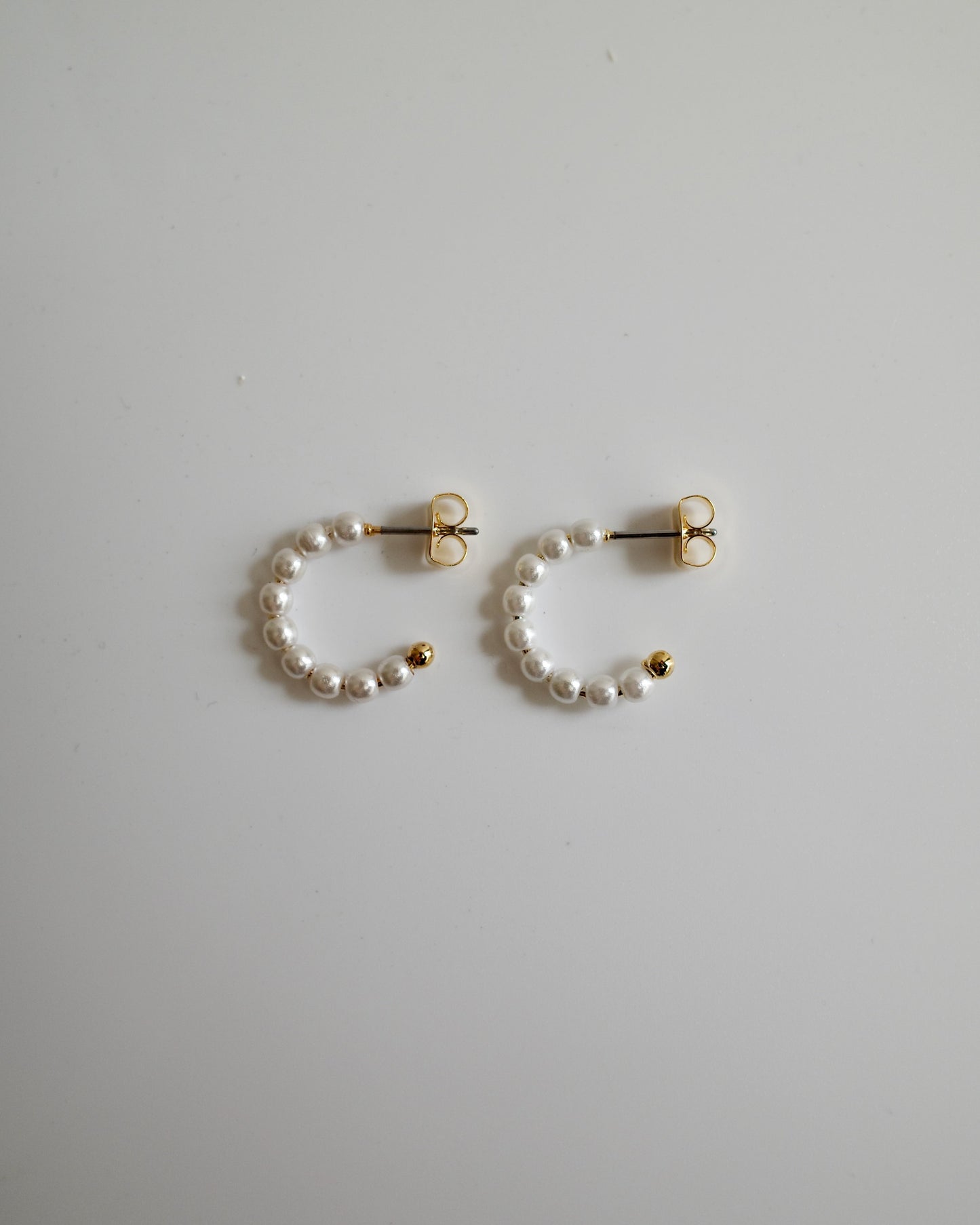 pearl curl pierce