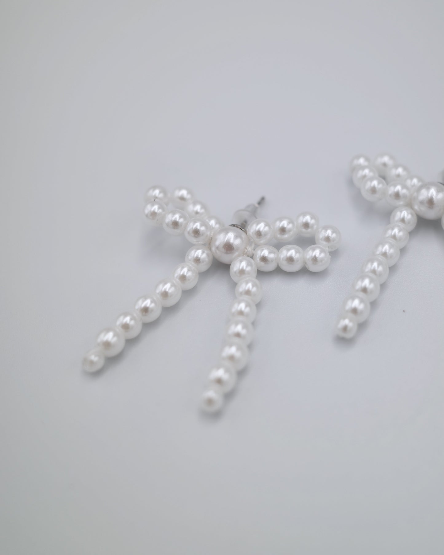 pearl ribbon pierce