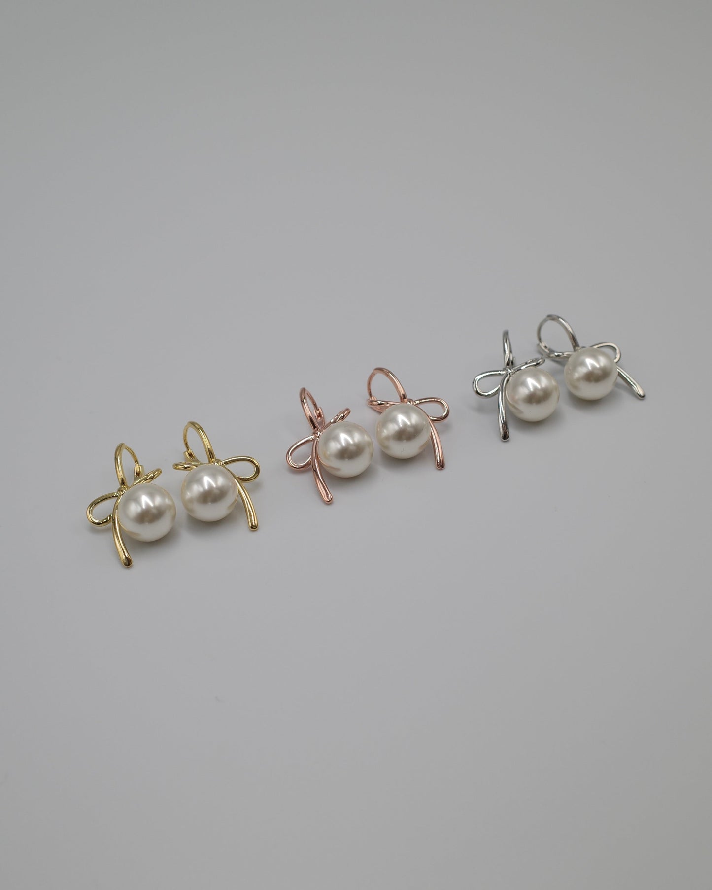 elegant pearl & ribbon pierce
