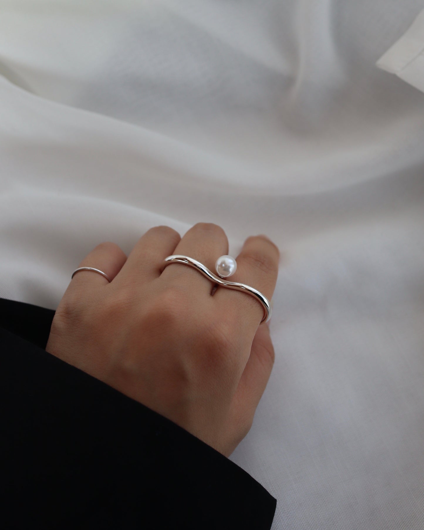 two finger pearl ring