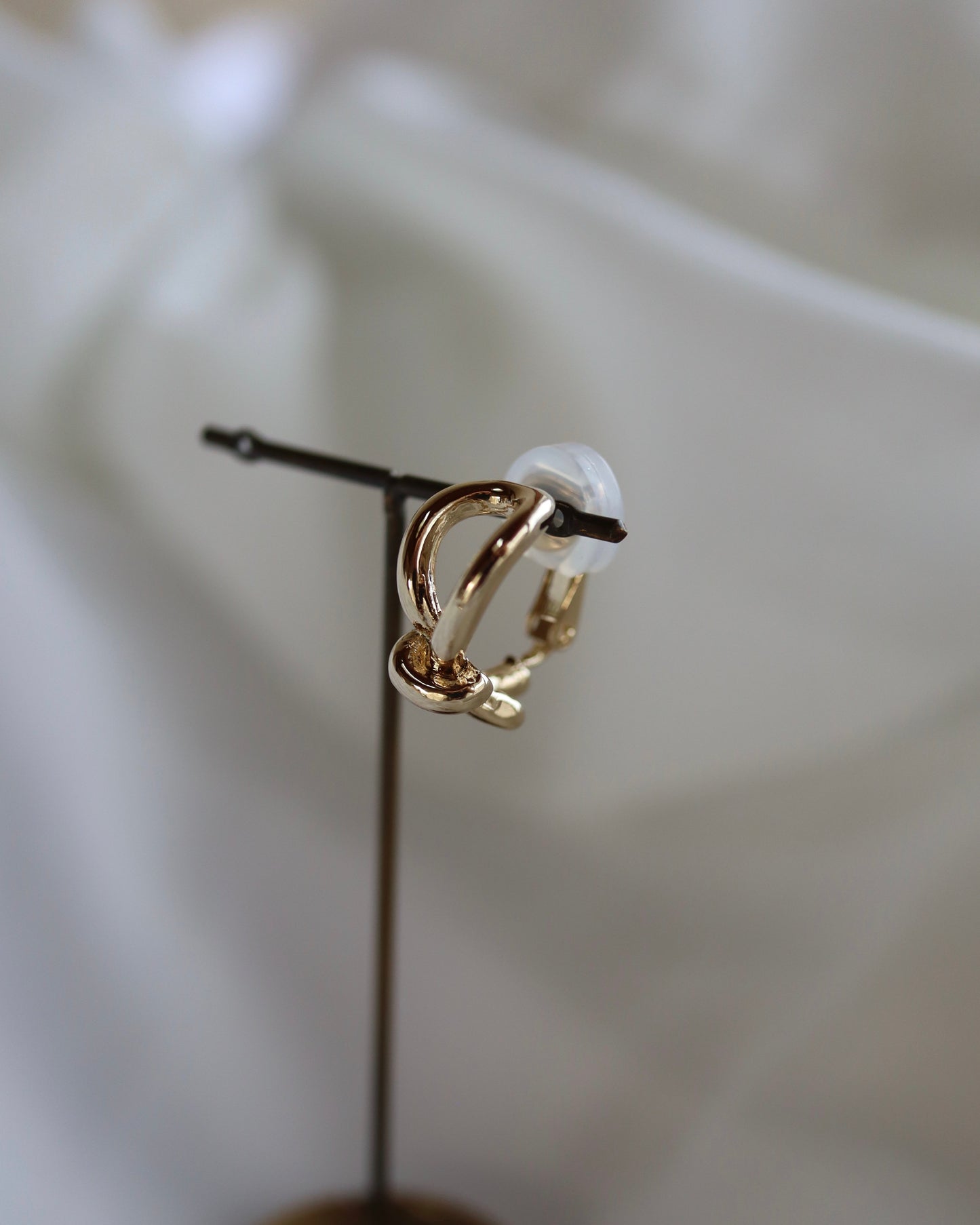 knot hoop earring