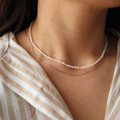 thin pearl necklace